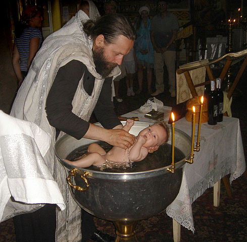 File:Act of baptizing.jpg