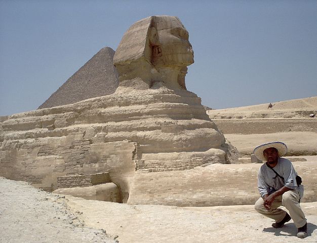 File:Tourist at Sphinx, Giza plateau.jpg